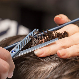 ULG Hair Cutting Scissors and Thinning Shears Kit laid out on a table