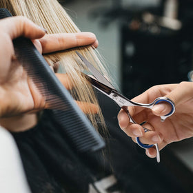 ULG Thinning Shears being used to texturize hair