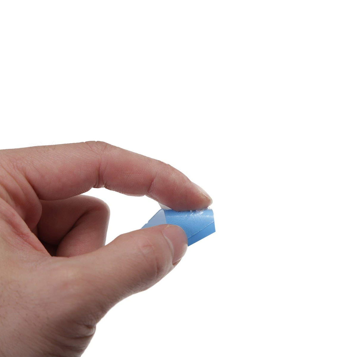 Ultra Hold Mini's Ultra Hold Mini Tabs Tape showing adhesive side