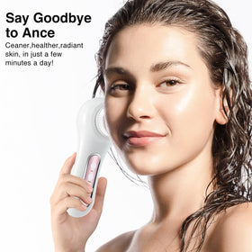 Umickoo Electric Facial Cleansing Brush showing interchangeable brush heads