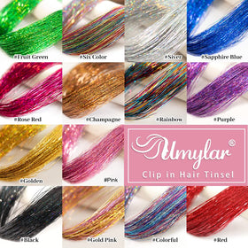 Umylar Pink Hair Tinsel in various colours on display