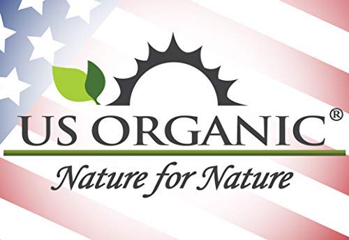 US Organic Myrrh and Frankincense Essential Oils on a wooden table