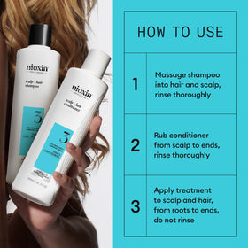 User applying NIOXIN System Kit 3 to scalp