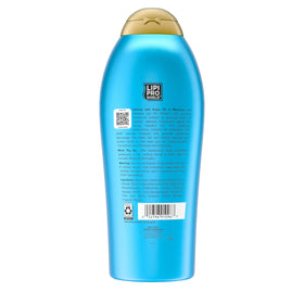 User applying OGX Conditioner on wet hair