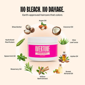 User applying oVertone Magenta Majesty Hair Mask