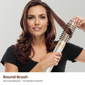 User styling hair with MESCOMB Hot Air Styler