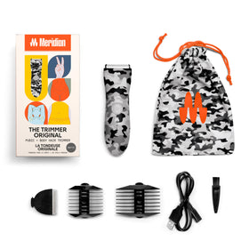 User trimming hair with MERIDIAN The Trimmer Original