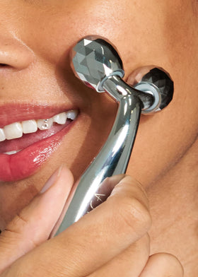 Using Pacifica face roller on cheekbones