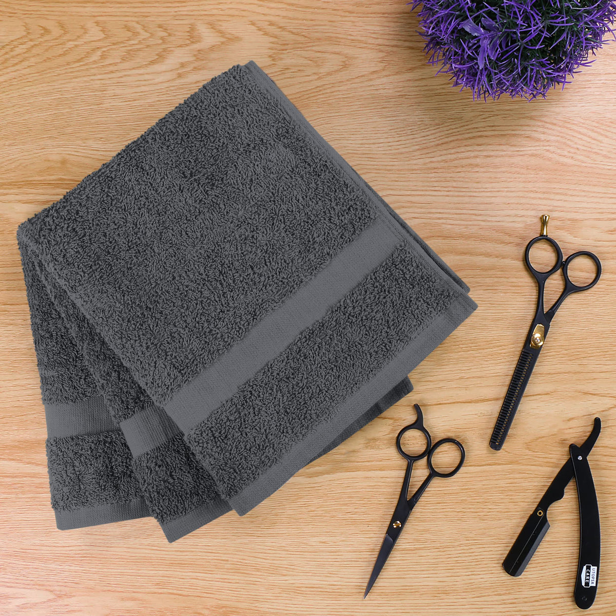 Utopia Towels salon towel stacked neatly on a table