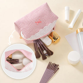 UUYUUY Makeup Bag displayed with beauty essentials