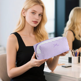 UUYUUY Makeup Bag displayed with beauty products