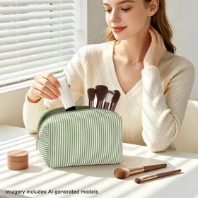 UUYUUY makeup bag set in a travel setting with a suitcase