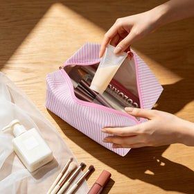 UUYUUY makeup bags arranged on a vanity