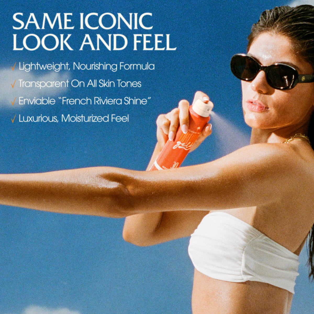 VACATION Orange Gelée SPF 30 Sunscreen Spray in lifestyle setting