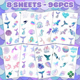 Various designs of mermaid tattoos displayed