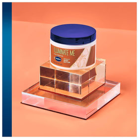 Vaseline Illuminate Me Body Butter jar with lid open