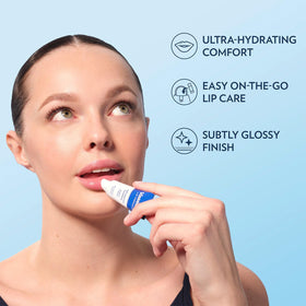 Vaseline lip balm application on lips