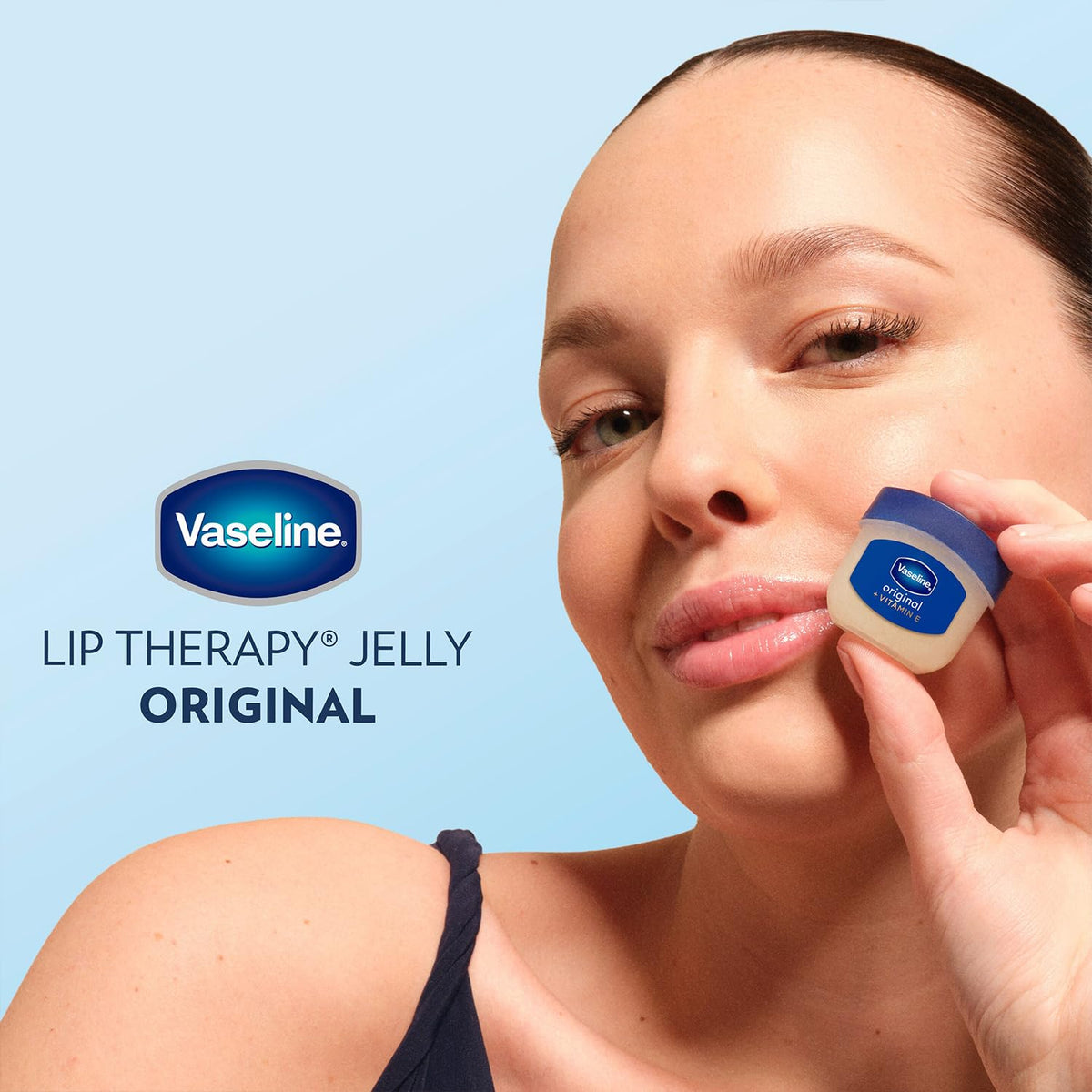 Vaseline Lip Therapy Original mini jar on a bathroom shelf