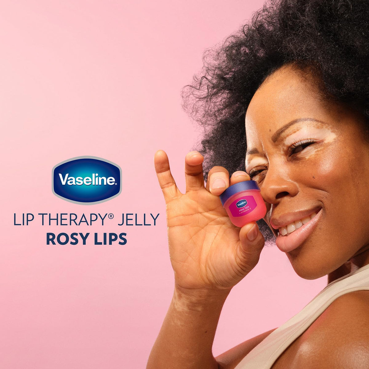 Vaseline Lip Therapy Rosy Lips with a rose flower background