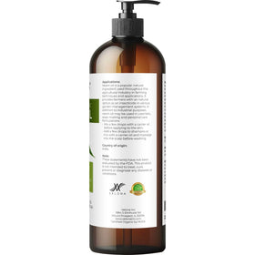 velona Organic Neem Oil with fresh neem leaves in the background