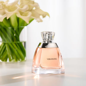 Vera Wang Eau de Parfum with floral background