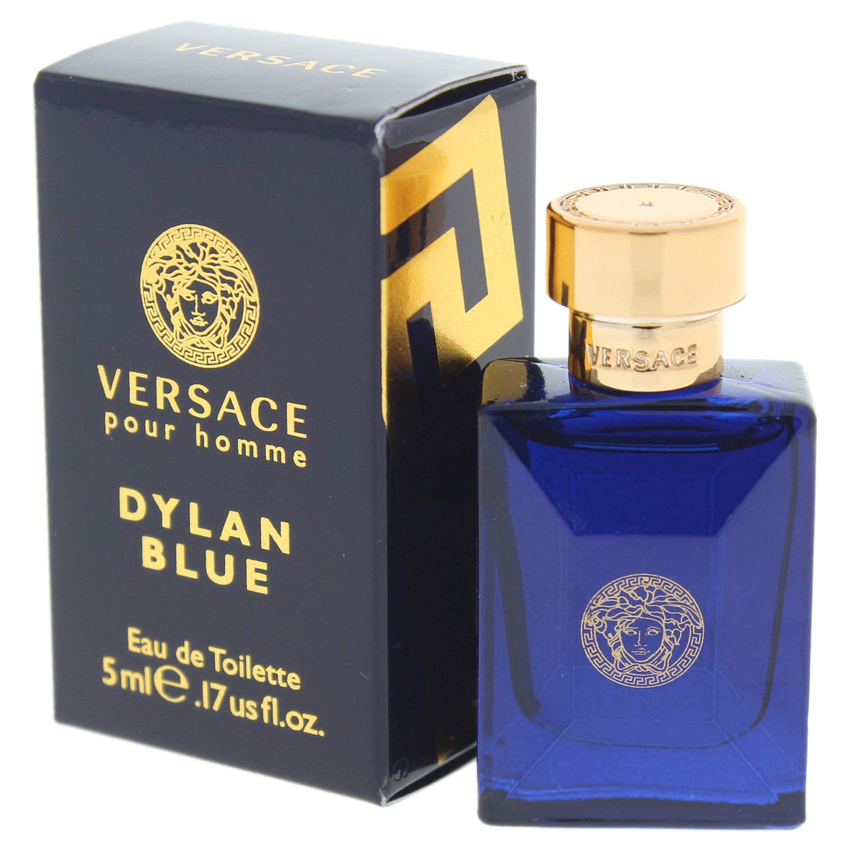 Versace Dylan Blue Mini Eau de Toilette splash on a wooden surface