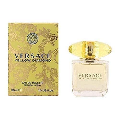 Versace Yellow Diamond Eau de Toilette Spray with floral background