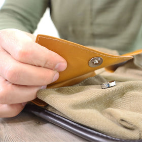 Vetelli Leather Toiletry Bag with toiletries inside