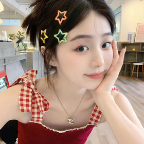 VIBILIA Star Hair Clips displayed with different hairstyles