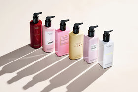 Victoria's Secret Bare Fragrance Body Lotion packaging on a vanity