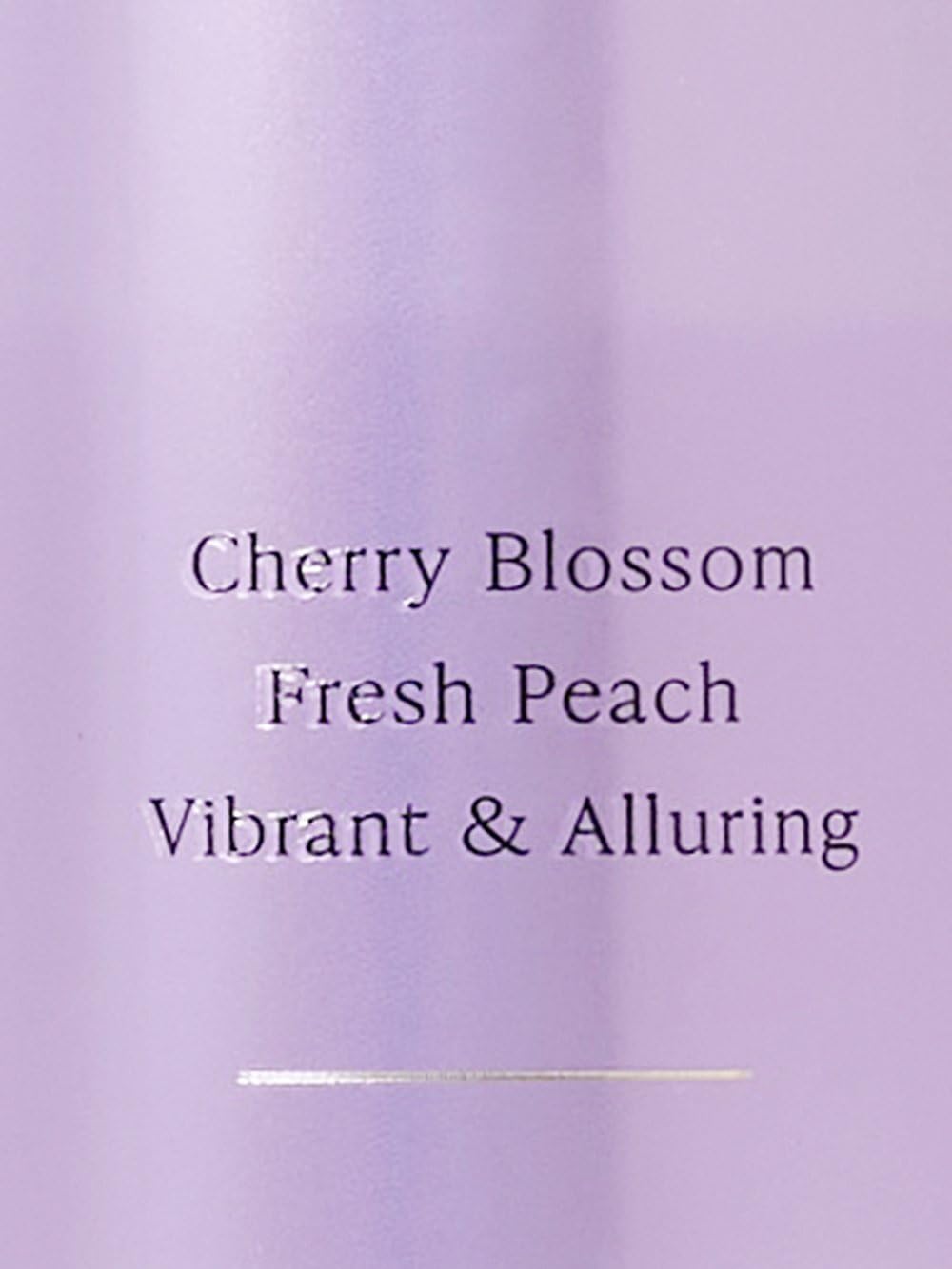 Victoria's Secret Love Spell Body Mist 8.4 fl oz on vanity