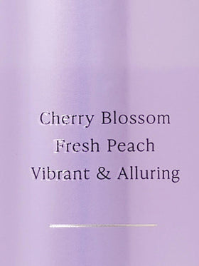 Victoria's Secret Love Spell Body Mist 8.4 fl oz on vanity
