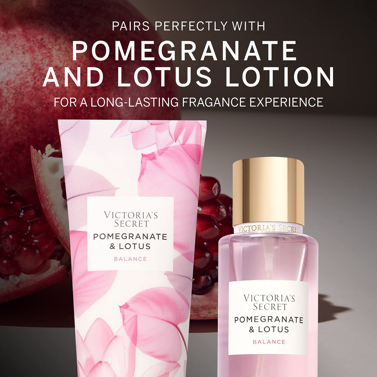 Victoria's Secret Pomegranate & Lotus Body Mist 8.4 fl oz on a vanity
