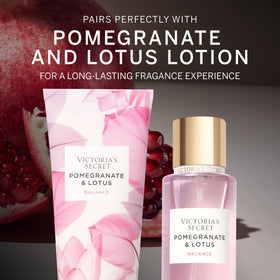 Victoria's Secret Pomegranate & Lotus Body Mist 8.4 fl oz on a vanity