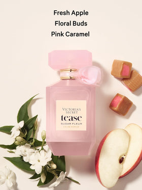 Victoria's Secret Tease Sugar Fleur bottle with floral background