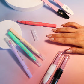 VICTORY NAIL Cuticle Oil Pen alongside nail care tools