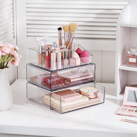 Vtopmart 3 Tier Clear Makeup Organizer on a bathroom vanity