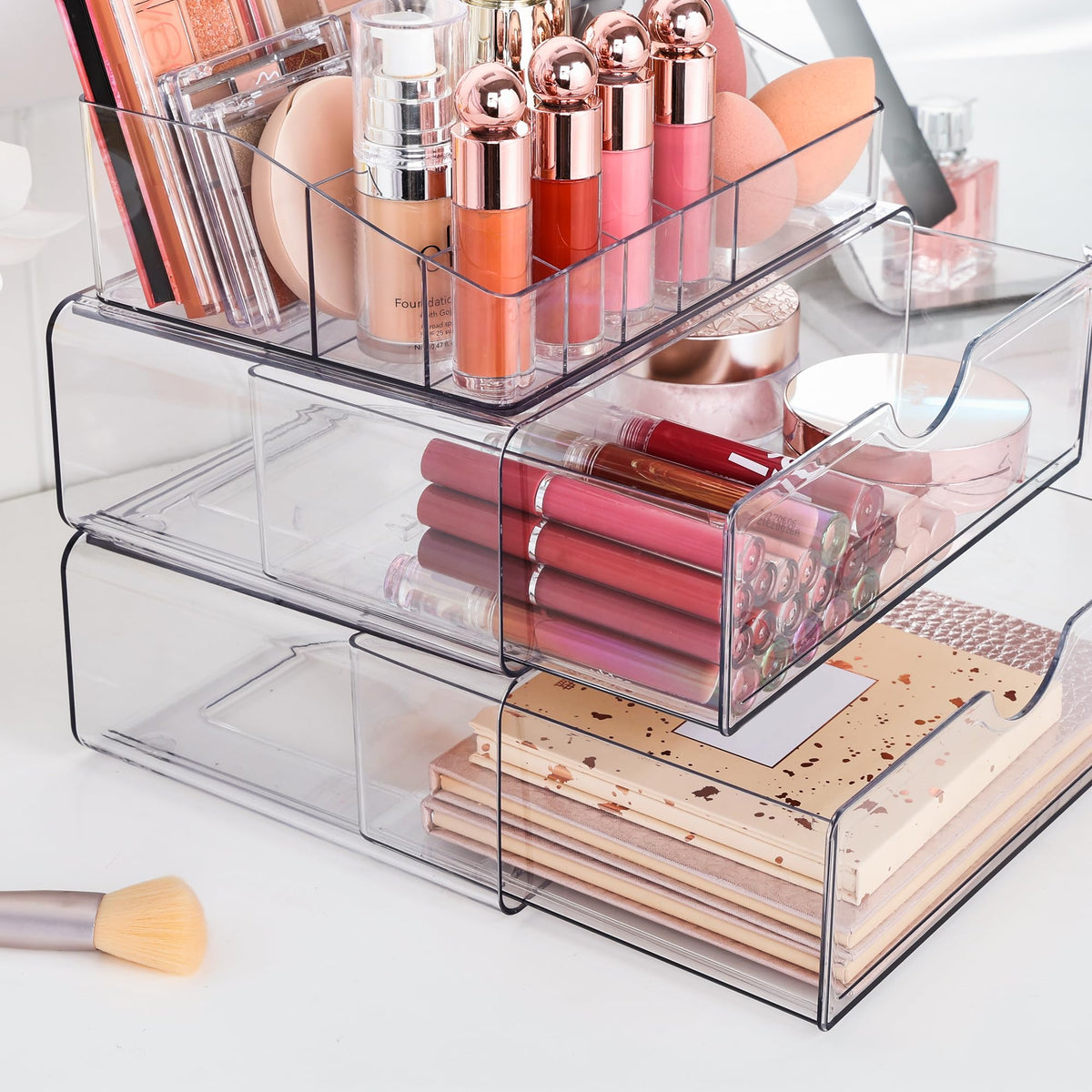Vtopmart 3 Tier Clear Makeup Organizer with beauty products arranged inside
