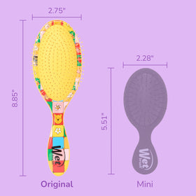 Wet Brush Disney Winnie The Pooh hair brush on a textured background