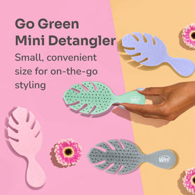 Wet Brush Go Green Mini Detangler with eco-friendly label