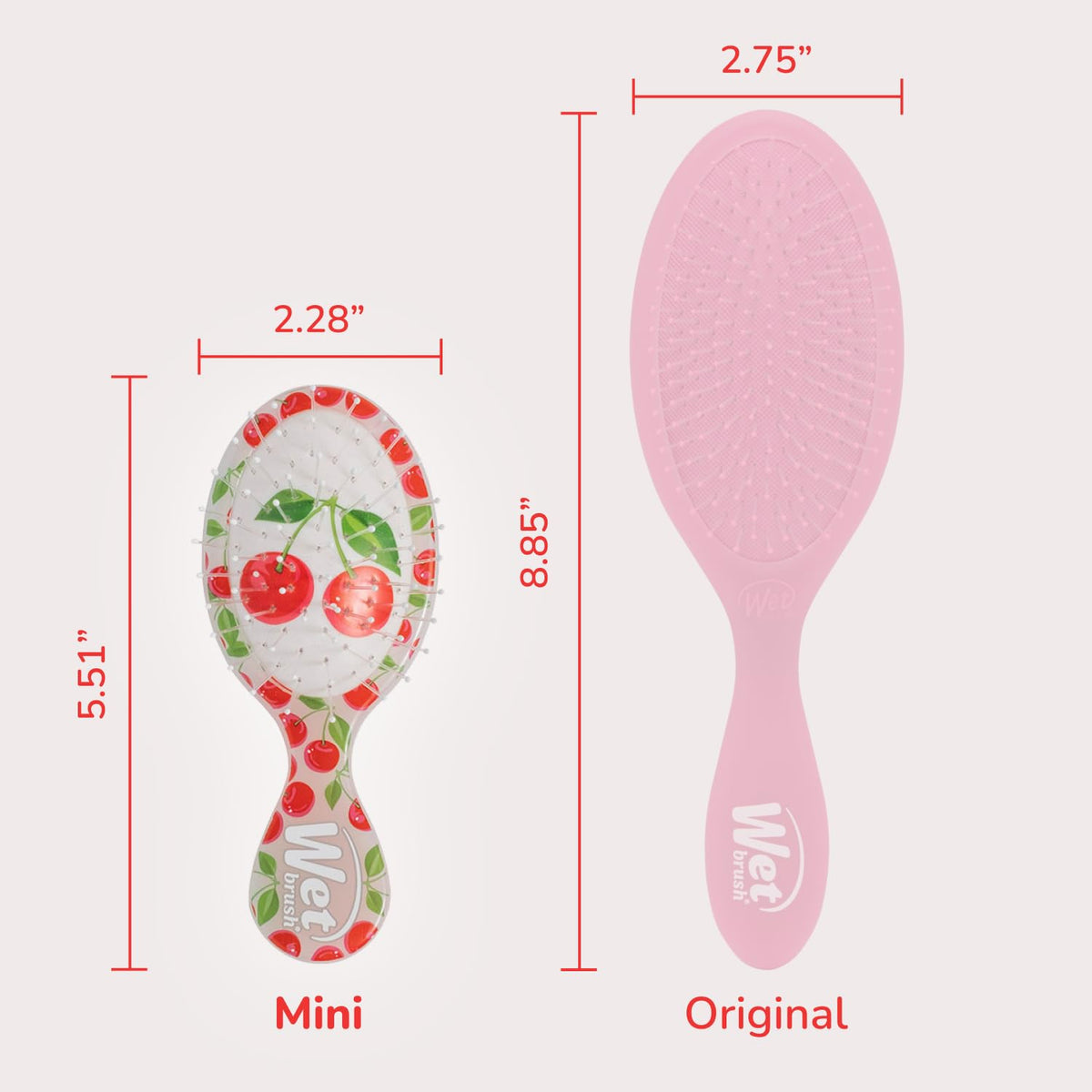 Wet Brush Mini Detangler Hair Brush in Cherry on a travel bag