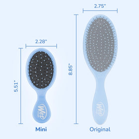 Wet Brush Mini Detangler on a bathroom counter