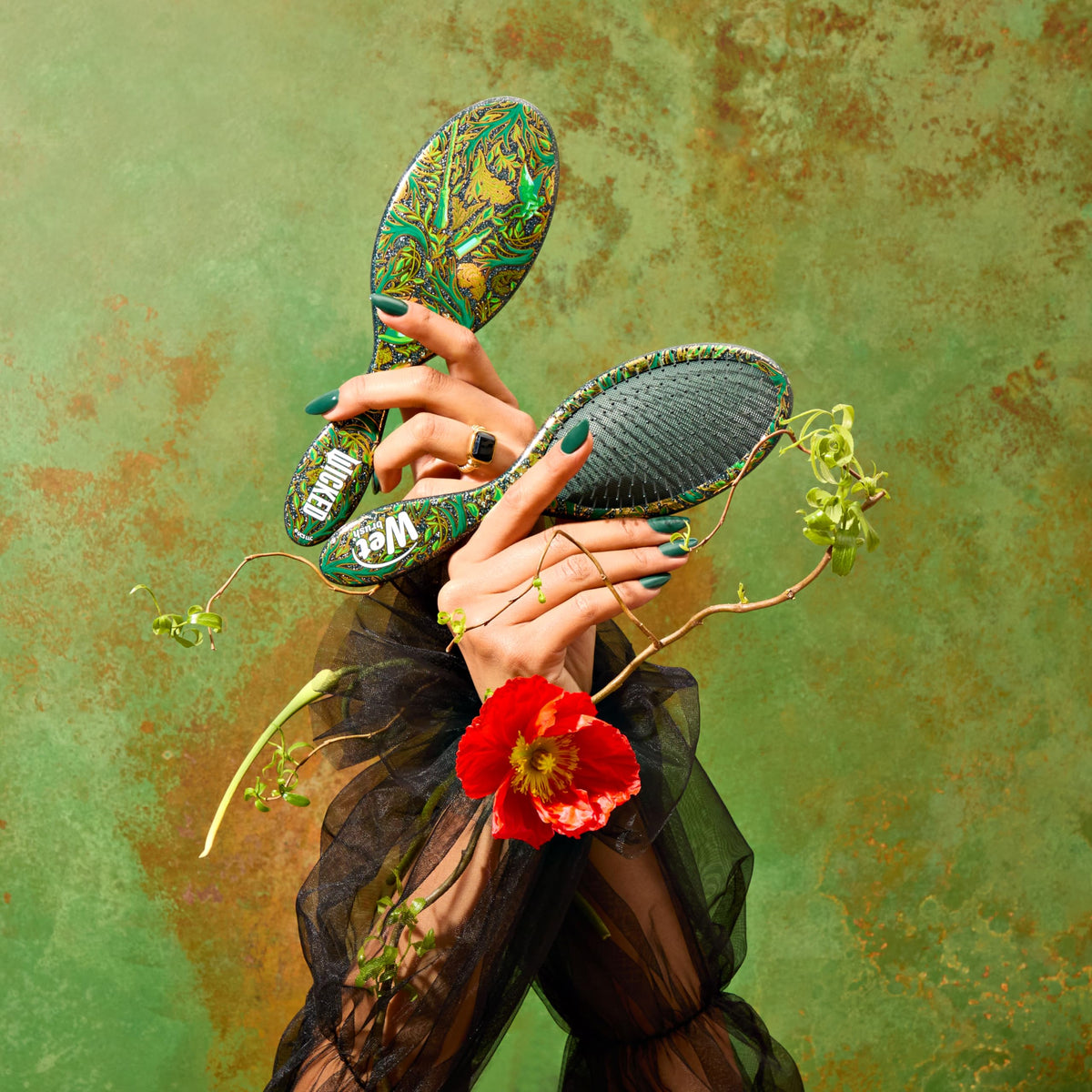 Wet Brush Original Detangler Elphaba side view with hair accessory