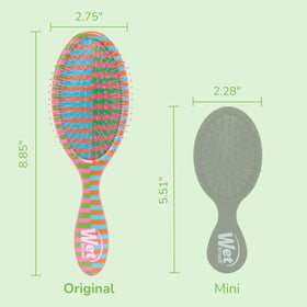 Wet Brush Original Detangler in hand demonstrating ergonomic handle