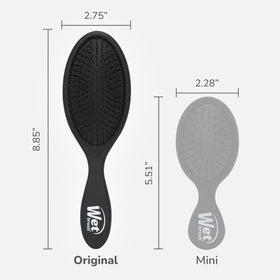 Wet Brush Original Detangler in hand demonstrating use