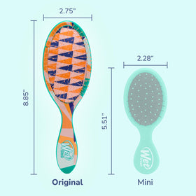 Wet Brush Original Detangler on a bathroom counter with hair products