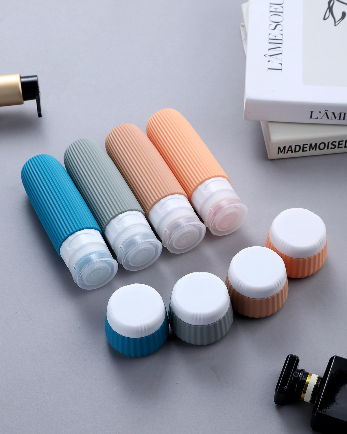 Wide opening design for easy filling of travel bottles
