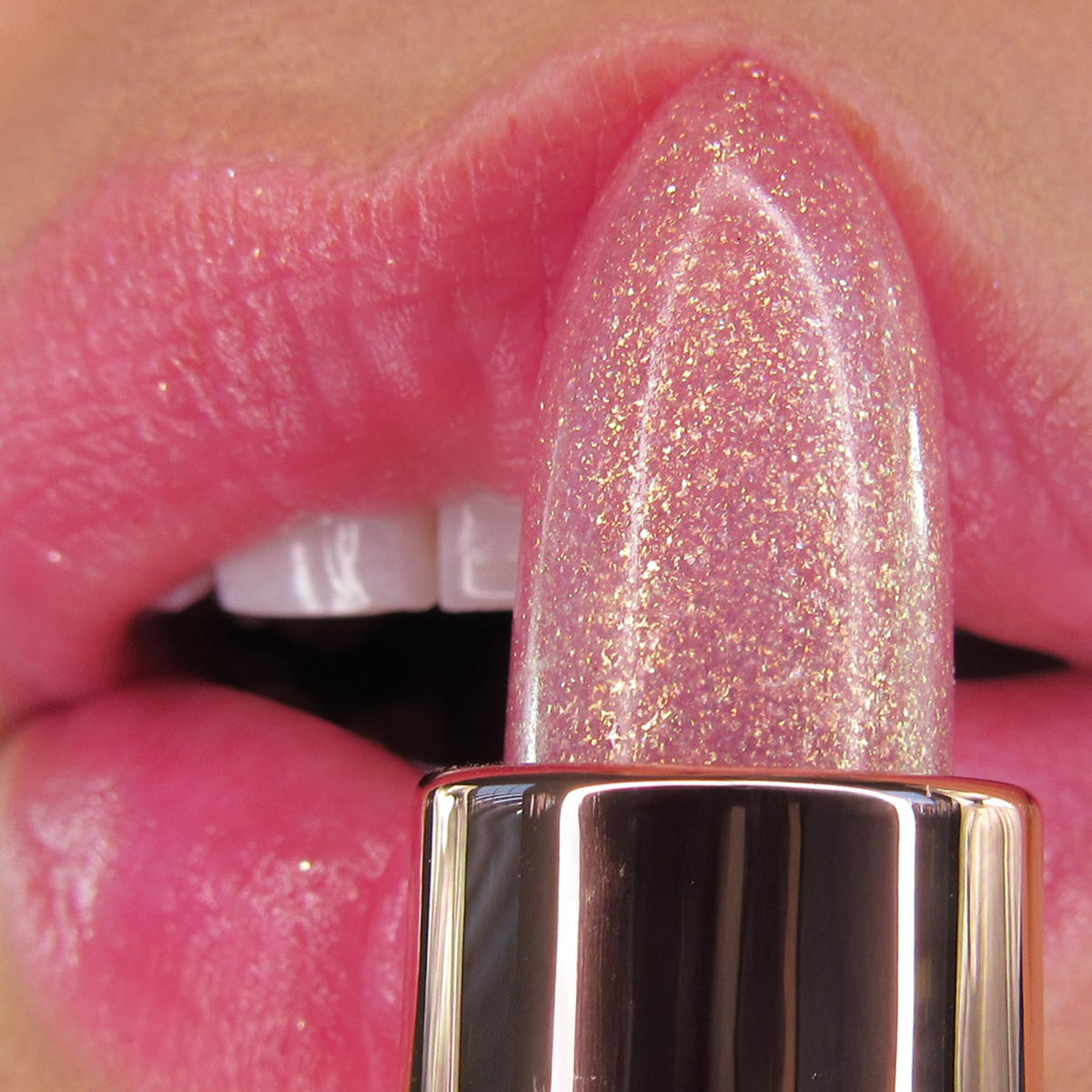 Winky Lux Unicorn Glimmer Balm with a close-up of its texture