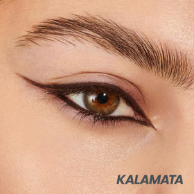 Wonderskin Eyeliner Pencil 1440 on a makeup table