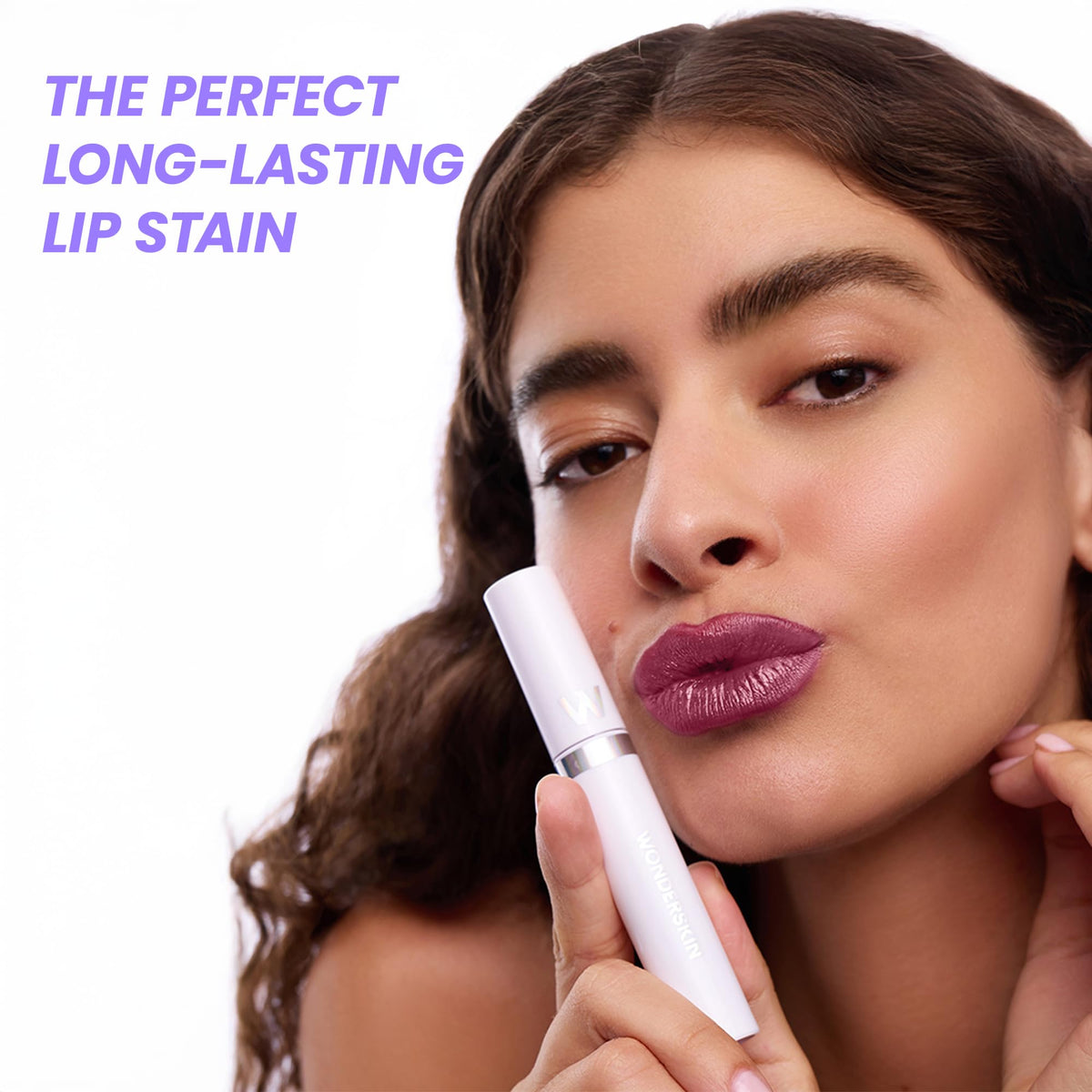 Wonderskin Lip Stain displayed with makeup accessories